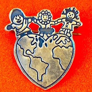 Vintage sterling silver Mexico Save the children heart world EFS pin